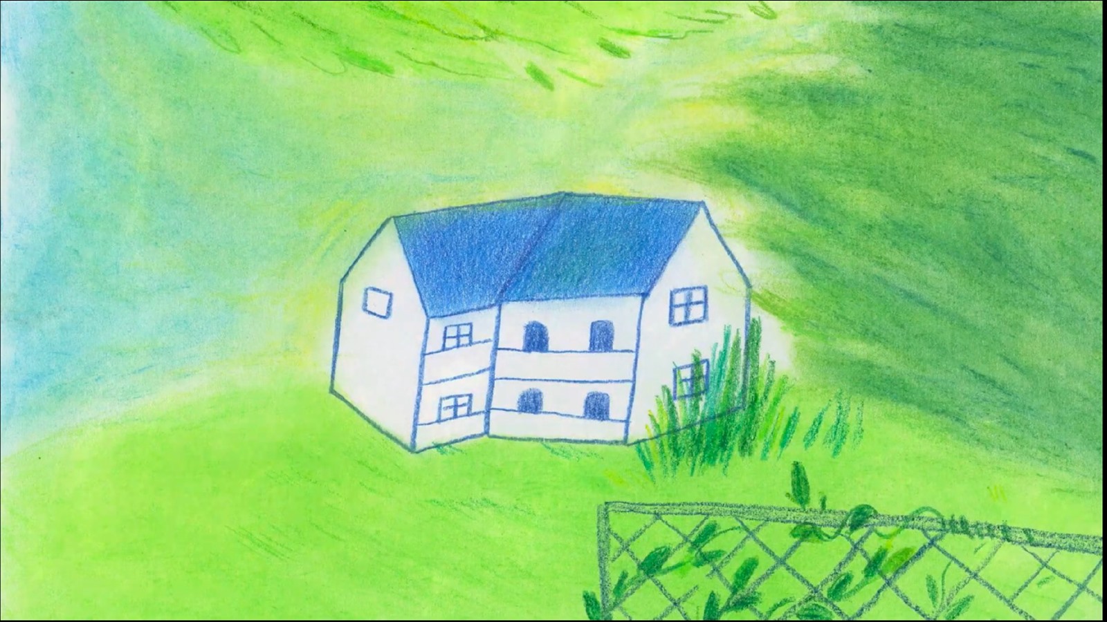 绿色山坡上的房屋画面